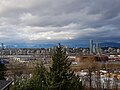 Distant view of the city of New Westminster with its collection of low and high rise condos